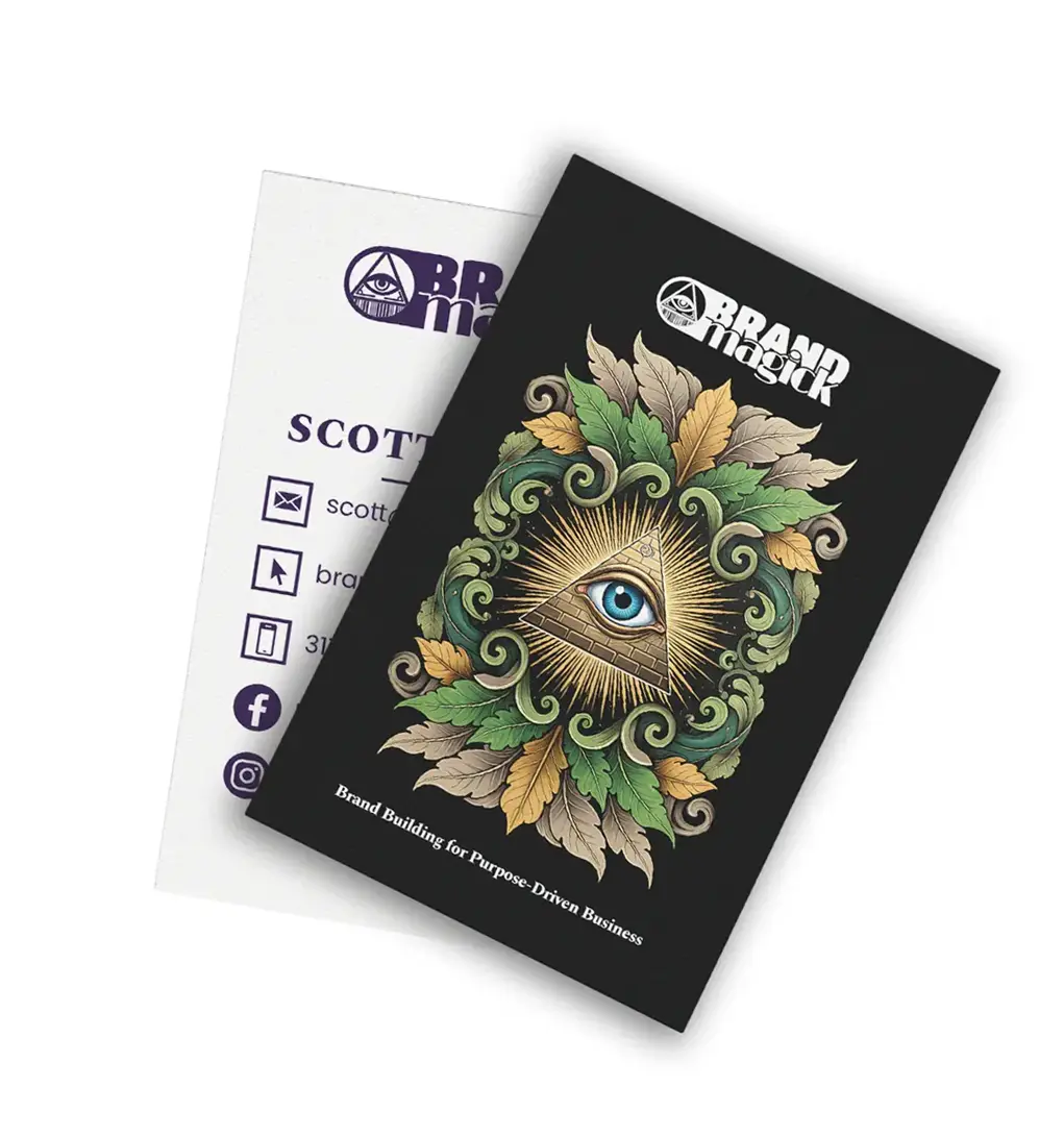 Business card with an ornated representation of the Brand Magick icon surrounded by leaves.